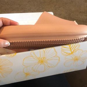 Rose gold pink colored slip on. Foam comfort.